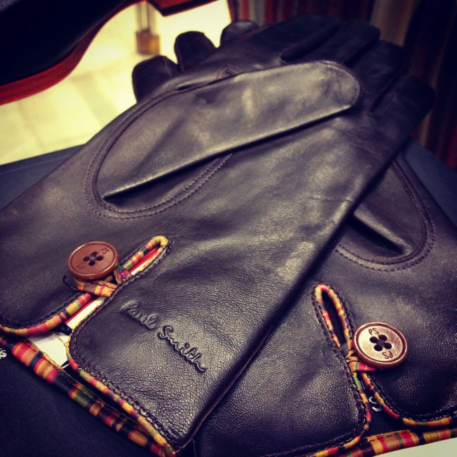 Paul Smith’s collections have always embraced both the rambunctious and the subtle. Here, otherwise regular black leather gloves are accented by his signature multistripe. A viewer would only notice a sense of je nai se quoi as the wearer un-gloved.