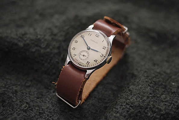 Commonly paired with 'tool' watches like divers and chronographs, the NATO strap can also be used with dress watches to achieve stylish contrast that engenders bystanders to take a second look.