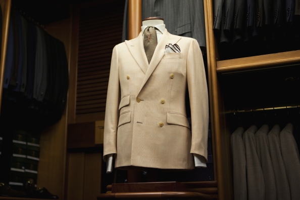 Image: The Sartorialist. Note the waist suppression on the double breasted coat even without being pinned at the back.