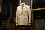 Image: The Sartorialist. Note the waist suppression on the double breasted coat even without being pinned at the back.