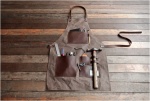 This stylish gentleman's apron will hold all your tools in place while you help that sexy next door neighbour with her plumbing.