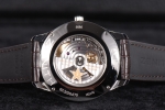 The Zenith Elite Captain with Central Seconds has a sapphire crystal caseback which displays superior decoration on the movement plates and weighted rotor.