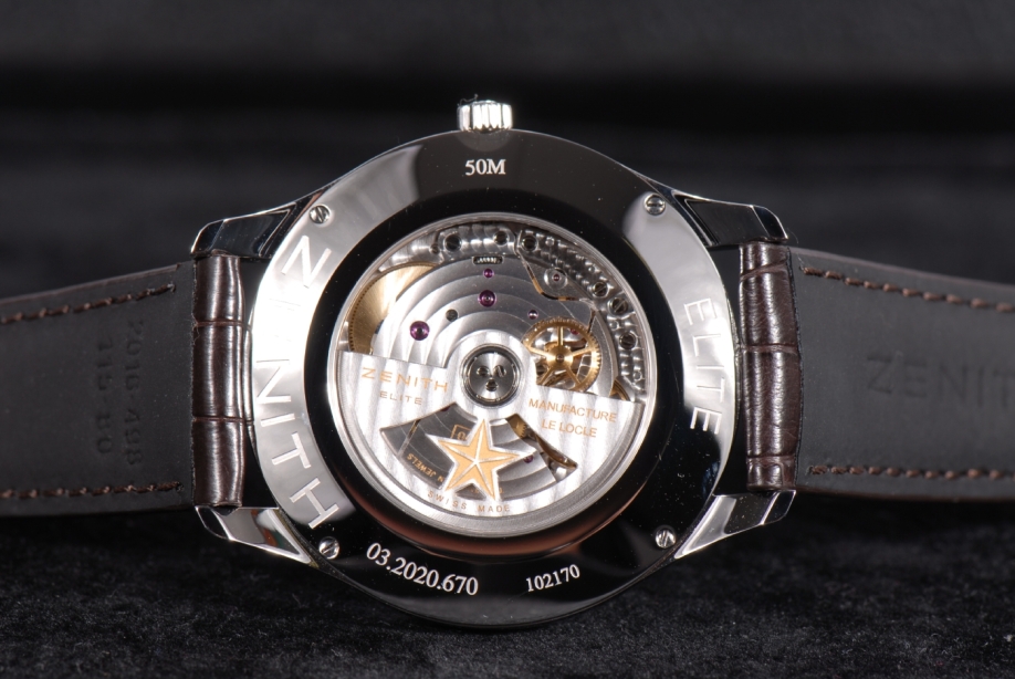 The Zenith Elite Captain with Central Seconds has a sapphire crystal caseback which displays superior decoration on the movement plates and weighted rotor.