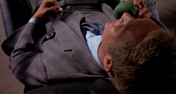 Nifty shades of grey: Steve McQueen in three-piece Prince of Wales glen plaid suit.