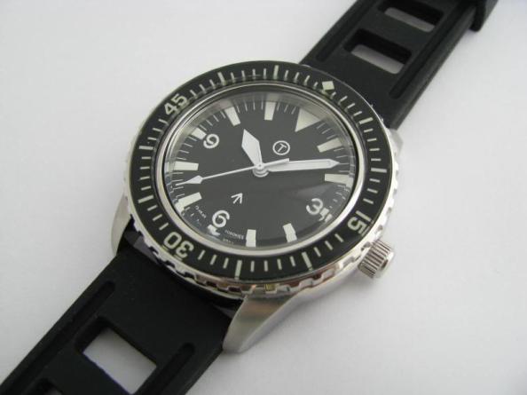 A military diving watch with sword hands rather than mercedes hands on a vintage Seamaster 300 homage.