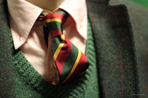 Colours well rocked. A layered look with necktie, coordinated cardigan beneath and a textured flannel blazer to anchor it all in a muted yet complimentary colour.