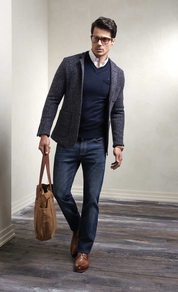 Eschew the tie but look professional with a different accessory: layered with a sweater and carrying a leather tote.