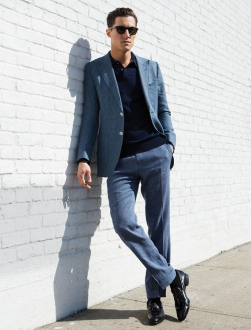 Dress down your full suit with a polo shirt. It's very Don Draper.